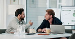 Businessmen, meeting and discussion with laptop for analytics or corporate performance in office. Men, employees or colleagues with graph, chart or company data for project revenue in workplace