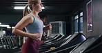 Fitness, gym and woman on treadmill for running, exercise and workout for sports. Cardio machine, training and person in health club for wellness, endurance practice and challenge with energy