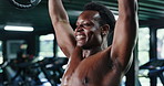 Fitness, smile and weightlifting with black man in gym for bodybuilding or strength training. Breathing, exercise and intensity with happy shirtless bodybuilder in health club for power or workout