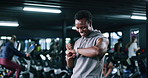 Smart watch, training or man with smile, fist pump or workout with app to track progress. Athlete, celebration or person in health center, digital info or achievement with fitness and exercise goals