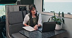 Freelancer, laptop and notebook with woman in van for digital nomad, travel blog and research. Remote worker, holiday journey review and rv campervan guide with person in vehicle for transport