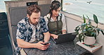 Couple, travel and people with tech, van and blogging with laptop on holiday, adventure and together. Digital nomad, woman and man with smartphone for research, writer and remote work in transport