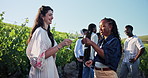 Friends, cheers or drinking wine in vineyard with smile for summer holiday, discussion or bonding. Countryside, winery tour or people in nature with alcohol drink for toast, vacation or conversation.