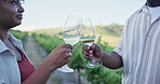 Couple outdoor, hands or wine tasting with cheers for relationship goals, bonding or holiday in Europe. Countryside, winery tour and married people in vineyard with toast, alcohol drink and vacation.