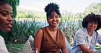 Happy, woman and people in nature with picnic for social gathering, conversation and bonding together. Face, person and friends outdoor with laugh for funny discussion, summer activity or connection.