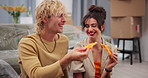 Couple, eating pizza and excited in new home on floor, toast or bonding with celebration for real estate. Happy man, woman and smile for fast food, hungry or goals with success at property investment