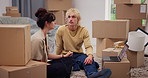New home, discussion and couple with stress, laptop and relationship with pain, angry and real estate. Cardboard, rental apartment or man with woman, pc and tension with argument, furious or fighting