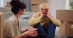 New home, talking and couple with stress, argument and headache with pain, frustrated and real estate. Cardboard, rental apartment and man with woman, migraine and tension with disagreement and angry