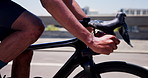 Hands, outdoor and man with bike, handle and training with fitness, routine and challenge. Safety, cyclist and healthy person in city, sports exercise and wellness with endurance and morning cardio