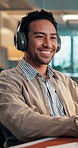 Headphones, smile and businessman in office with music, entertainment or dance on break. Audio, happy employee and listening to radio in workplace, streaming service and song with online playlist