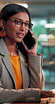 Phone call, communication and woman with discussion in office for creative project with online article. Smile, glasses and magazine editor with typing for feedback, review or publishing on technology