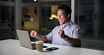 Happy man, night and winning with laptop in office for business success or bonus in office. Excited, male person or smile with computer or fist pump in late evening for good news, prize or promotion