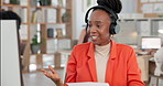 Happy woman, headphones or discussion with video call for consultation or online advice in office. Female person, financial advisor or webinar with documents for customer service or virtual meeting