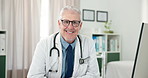 Doctor, mature man and smile with face in office with paperwork for medical admin or online consulting. Person, medicine expert and portrait in clinic with confidence, technology and healthcare