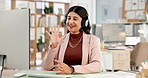 Happy woman, consultant and wave with headphones for video call, online meeting or advice in office. Female person, agent or hello with smile on computer for conversation, discussion or virtual chat