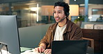 Help desk, contact us and man typing on computer for IT feedback, assistance or advice at night. Tech support, smile and person speaking with technician for troubleshooting in call center on overtime