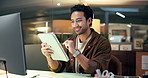 Tablet, computer and businessman in office for research on creative project with online blog. Digital technology, reading and male editor with email for feedback on publishing in at startup agency.