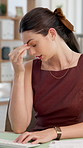 Frustrated, woman and burnout in office with migraine, headache or stress. Anxiety, pressure and female person with brain fog in creative agency with fatigue, strain or pain exhausted in workspace