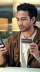 Man, phone and credit card in office at night for online shopping, easy payment and banking. Male person, mobile app and purchase for ecommerce, update budget and information of subscription deadline