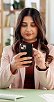 Business, typing or Indian woman in office with phone, social media update or client chat on online app. Digital, reading or employee with tech, message feedback or notification on stakeholder email.