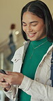 Teenager, high school or girl typing with phone, send message or check digital platform for class location. Academy schedule, reading or student in corridor with mobile app, smile or lesson info
