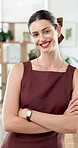 Creative, crossed arms and face of woman in office with confidence, pride and journalism career. Publishing, media agency and portrait of person with smile for copywriting, editing and reporter job