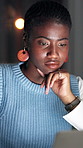 Black woman, laptop and thinking at startup, review and night with project management at media company. Person, writer and computer with decision for article, insight or overtime at creative agency