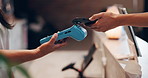 Person, hands and pos machine with phone for payment, fintech or wireless transaction in shop. Closeup, people or customer paying with mobile smartphone, scan or NFC for banking or checkout in store