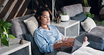 Woman, laptop and drip therapy in lounge, relax or typing with saline solution for immune system boost. Person, computer and iv for wellness benefits, vitamin or mineral infusion with search on web