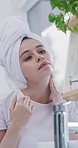 Woman, skincare or beauty with morning routine in bathroom for anti aging skin or hygiene in home. Female person, lotion or moisturizer with product for cleanliness, dermatology or treatment in house