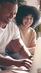 African couple, finance documents and laptop on sofa, smile and budget review in living room. People, happy and discussion with computer, planning or typing for asset management paperwork in home