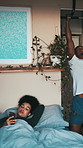 Relax, phone and couple with pull ups in bedroom, exercise or browsing social media on weekend. Mobile, African man and woman in bed at home for text message with communication app, fitness or health