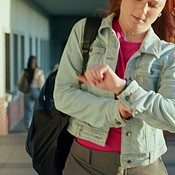 Check time, student and girl with education, late and knowledge with ...