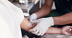 Hands, iv and wellness with people in drip lounge for arm preparation, benefits or recovery. Fluid, healthcare or medical infusion with customer and nurse in clinic for mineral or vitamin solution