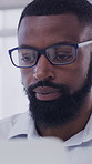 Glasses, research and reading with business black man in office for planning, account manager and review. Portfolio report, eyewear fatigue and online with person in agency for proposal and idea