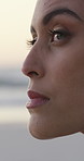 Closeup, thinking and woman travel at beach with vision, calm morning and holiday getaway. Thoughts, person or peace with reflection, fresh air and ocean sightseeing with nostalgia memory on vacation