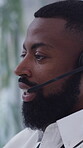Call center, help and black man in office with headset, contact us and assistance in crm service. Telecom, explaining and consultant in agency with tech, advisory and feedback in client support.
