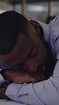 Night, tired and sleeping with business black man in office for fatigue, account pressure or burnout. Overworked, mental health and tax crisis with exhausted person in agency for application deadline
