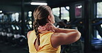 Back, woman and discomfort of neck pain at gym from fitness injury, muscle strain and pressure. Female person, cramps and joint inflammation from workout accident, exercise mistake and fibromyalgia