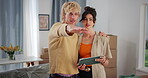 Tablet, moving and idea with couple in new house for interior design, real estate development and boxes. Rental property, home renovation and digital layout idea with man and woman in apartment