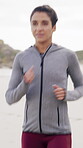 Active, fitness and running with woman on beach in morning for cardio improvement or training. Exercise, health and sport with athlete or runner on coast for commitment or workout dedication