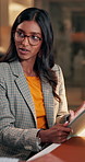 Discussion, business woman and tablet at night for editorial guidance, story feedback and advice. Publishing agency, editor and digital tech for breaking news update, topics review and blog deadline