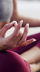 Beach, hands and woman with yoga, lotus and meditation with wellness, chakra and routine. Zen, yogi and healthy person with exercise, morning and posture workout with mindset, balance and breathing