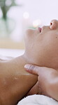 Massage, neck and skincare with woman at spa for deep tissue treatment, stress relief and relax. Hospitality, oil therapy and holistic healing with person in resort for pamper, wellness and bokeh