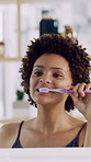 Woman, brushing teeth or hygiene in bathroom with mirror for morning routine, grooming or dental health. Reflection, female person and clean mouth in home with toothbrush, oral care or getting ready.