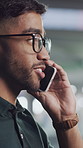 Man, phone call and explanation in office with discussion for project management and laugh in company. Person, joke and talk with agreement, review and feedback negotiation at creative agency