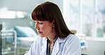 Thinking, doctor and woman in hospital with problem solving, writing and results for solution. Person, medical professional and idea for healthcare, planning or reflection for research in clinic