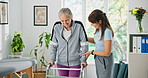 Physiotherapy, walking and senior woman with help for consulting, wellness or medical service. Healthcare, clinic and physical therapist with mature patient for support, mobility exercise or recovery