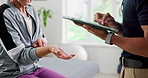 Physiotherapy, hands and old woman with wrist pain on tablet for medical service, wellness or consulting. Healthcare, tech and physical therapist with senior patient for help, arthritis or tendinitis