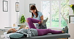 Physiotherapy, legs and woman with patient in clinic for knee pain, consultation and medical service. Healthcare, physical therapist and chiropractor with person for stretching, recovery and healing